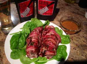 Pancetta wrapped Pork Tenderloin with mangia cajun sauce