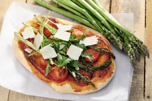 Food: Asparagus, rocket and cherry tomato pizza with Parmesan